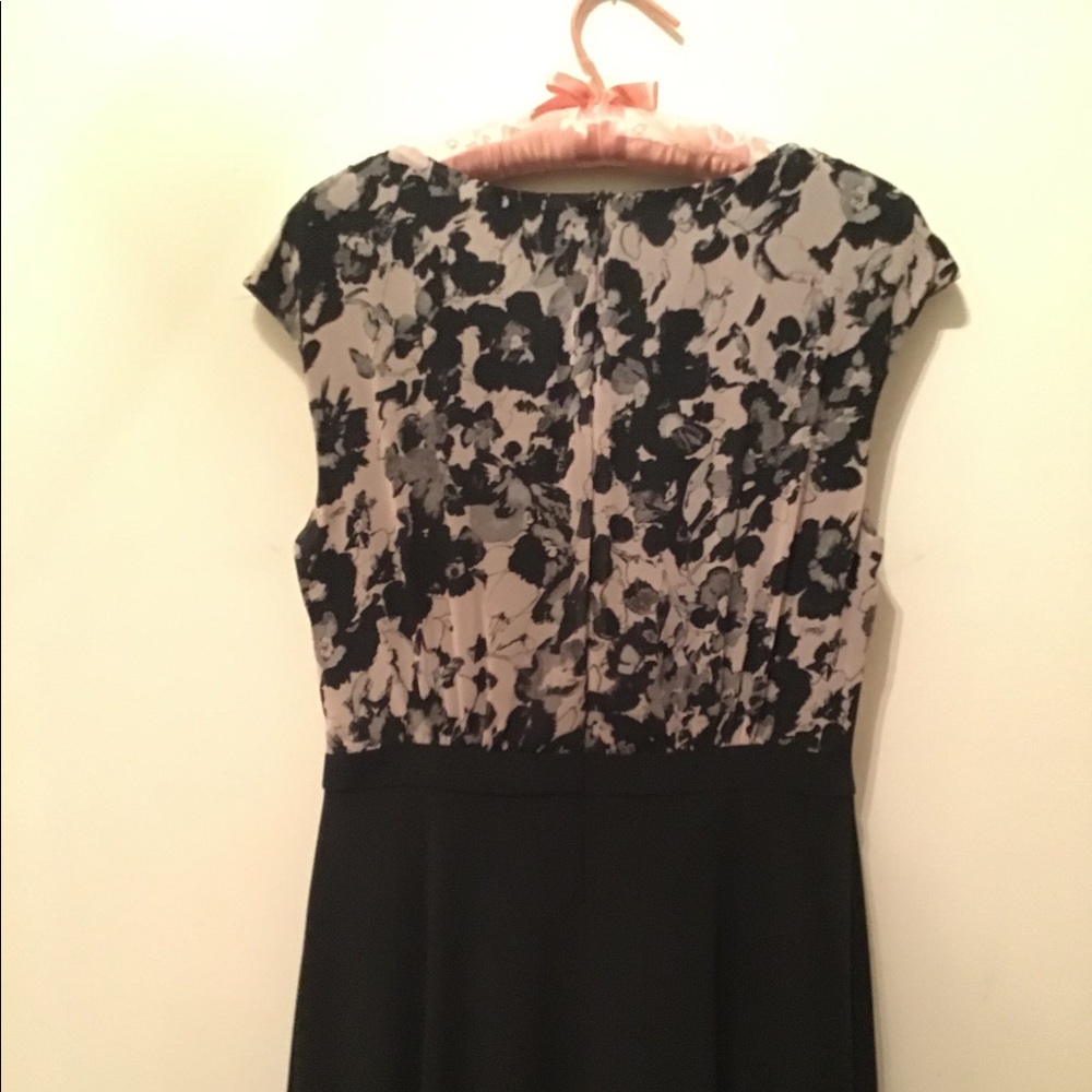 10 petite dress with black skirt and floral top.